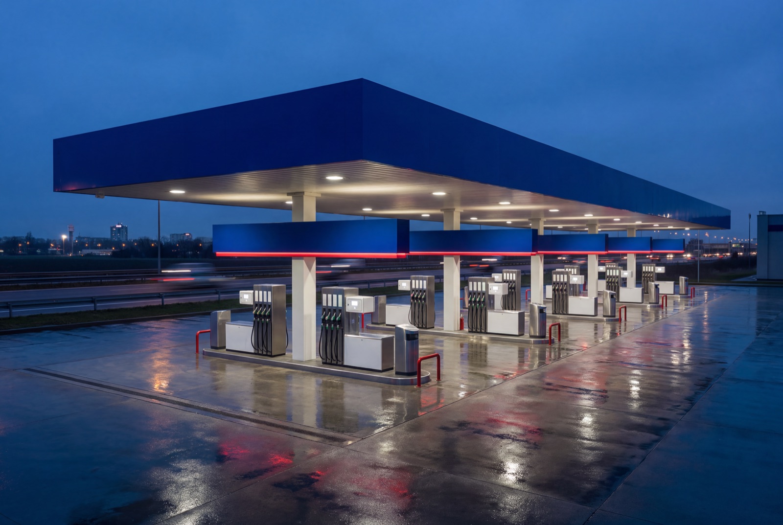 Branded major-oil fuel station at dusk